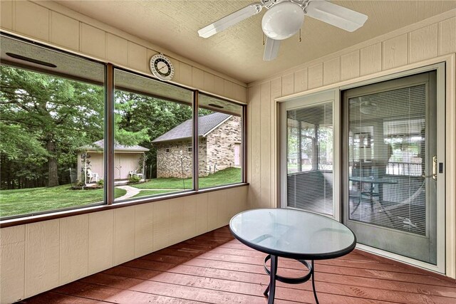 8553 Stoner Ln, Rogers, AR 72756 - sunroom / solarium featuring a ceiling fan