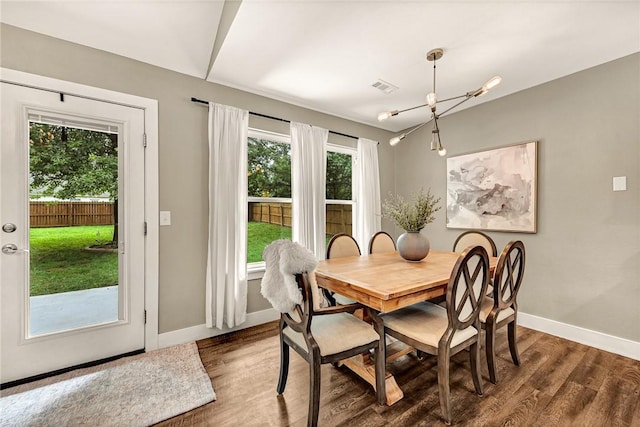 1314 N Fieldstone Ave, Fayetteville, AR 72704 - dining area with healthy amount of natural light and dark wood-style flooring