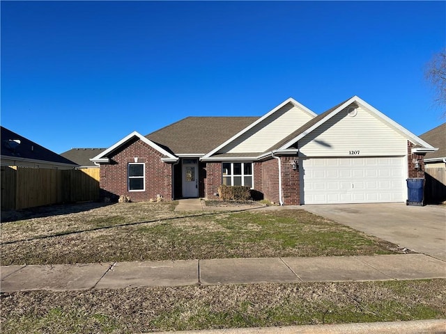 1207 E Liberty, Siloam Springs, AR 72761 - ranch-style home with brick siding, a garage, and driveway