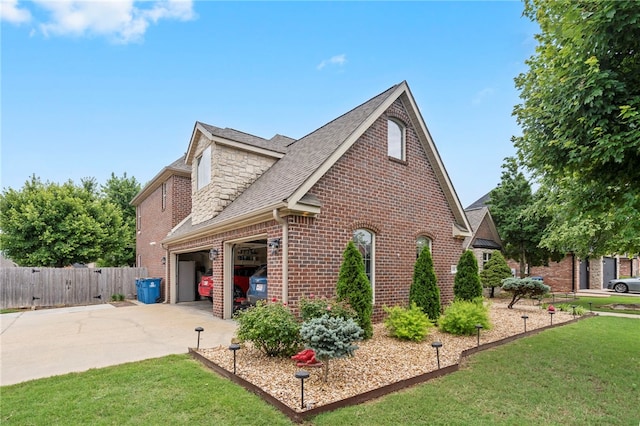 501 SE Fullerton St, Bentonville, AR 72712 - view of side of property featuring brick siding, driveway, roof with shingles, and a garage