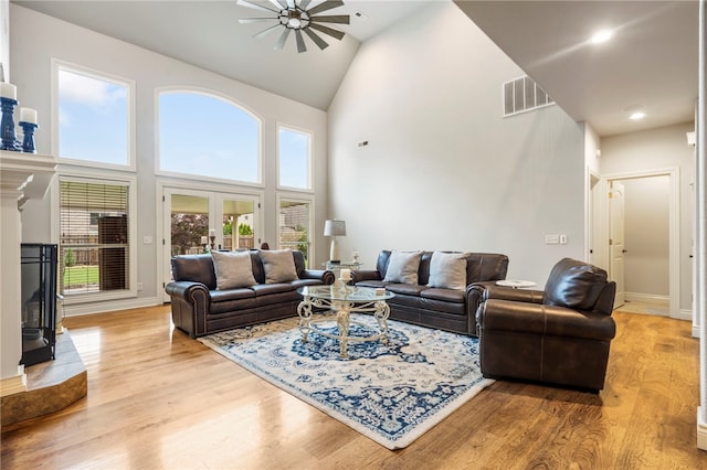 501 SE Fullerton St, Bentonville, AR 72712 - living area with high vaulted ceiling, ceiling fan, wood finished floors, recessed lighting, and french doors