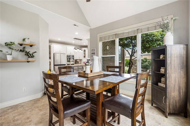 501 SE Fullerton St, Bentonville, AR 72712 - dining space with lofted ceiling and recessed lighting