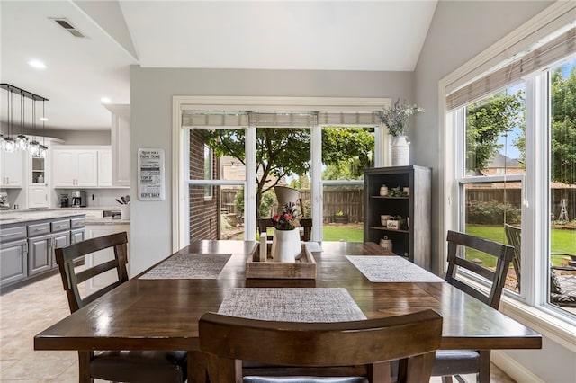 501 SE Fullerton St, Bentonville, AR 72712 - dining area featuring vaulted ceiling and recessed lighting