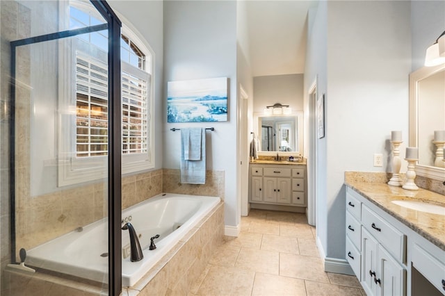 501 SE Fullerton St, Bentonville, AR 72712 - full bathroom with a bath, vanity, a tile shower, and tile patterned floors