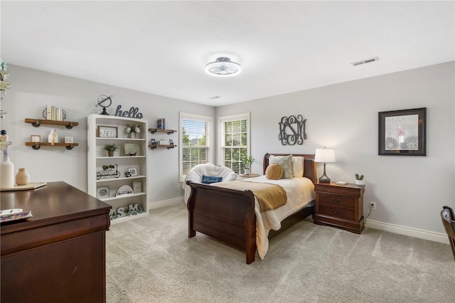 501 SE Fullerton St, Bentonville, AR 72712 - bedroom featuring light colored carpet and baseboards