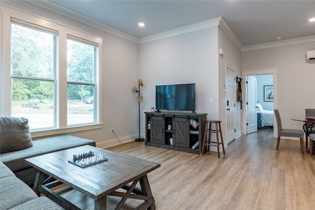315 E 11th St, Fayetteville, AR 72701 - living area featuring light wood finished floors, ornamental molding, recessed lighting, and a wall unit AC