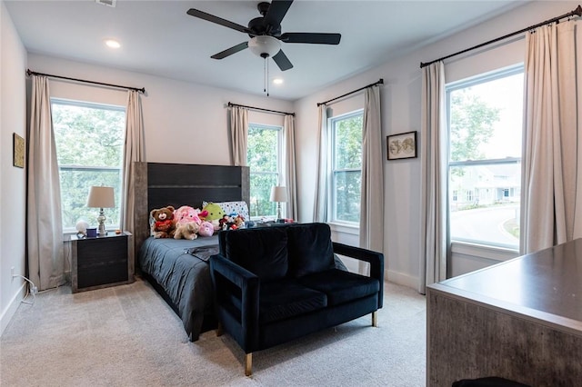 315 E 11th St, Fayetteville, AR 72701 - bedroom with light colored carpet, recessed lighting, and a ceiling fan