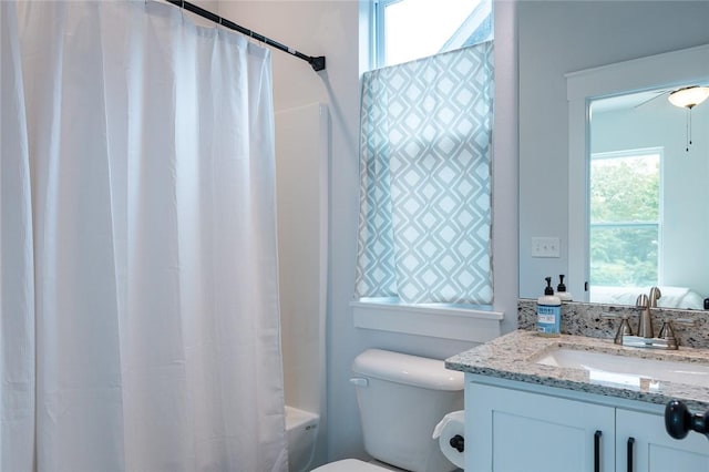 315 E 11th St, Fayetteville, AR 72701 - bathroom with vanity and shower / bath combo with shower curtain