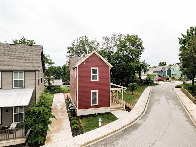 315 E 11th St, Fayetteville, AR 72701 - view of outbuilding with covered porch and a residential view