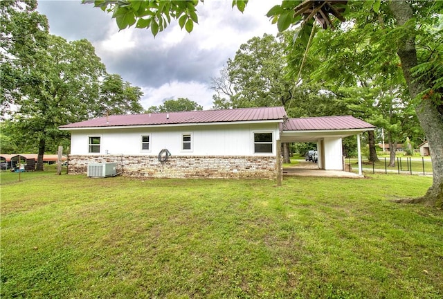 285 S 2nd St, Oaks, OK 74359 - rear view of property featuring brick siding, a carport, and a metal roof