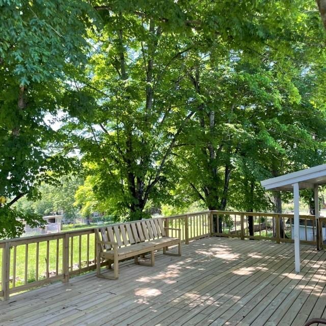 4841 Business Highway 412, Huntsville, AR 72740 - wooden deck with view of wooded area