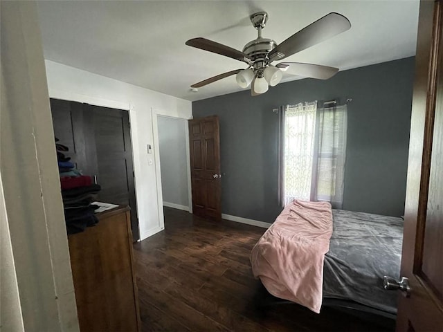 602 E Church Ave, Berryville, AR 72616 - bedroom with dark wood-type flooring and ceiling fan