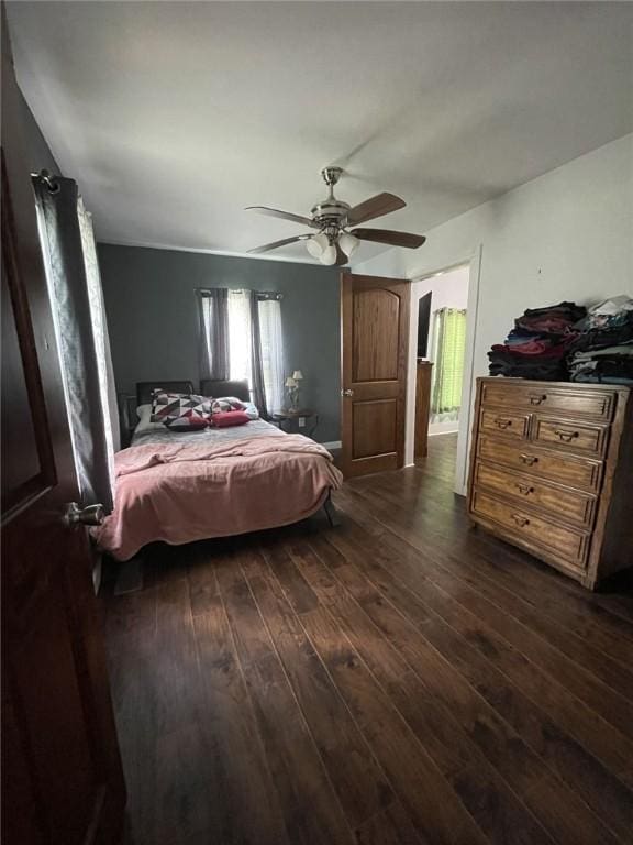 602 E Church Ave, Berryville, AR 72616 - bedroom featuring dark wood-style flooring and ceiling fan