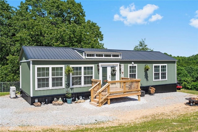 132 N Nature Trl Ln, Noel, MO 64854 - view of front of house featuring a metal roof, an outdoor fire pit, and french doors