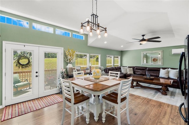 132 N Nature Trl Ln, Noel, MO 64854 - dining room with wood finished floors, french doors, a wall unit AC, ceiling fan, and plenty of natural light