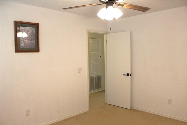 32 Table Rock Dr, Holiday Island, AR 72631 - empty room featuring ceiling fan and light colored carpet