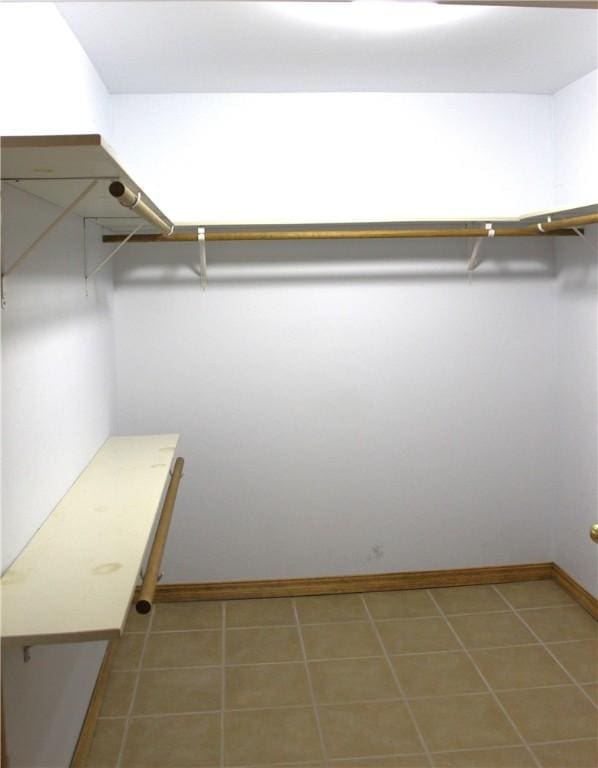 32 Table Rock Dr, Holiday Island, AR 72631 - walk in closet featuring light tile patterned flooring