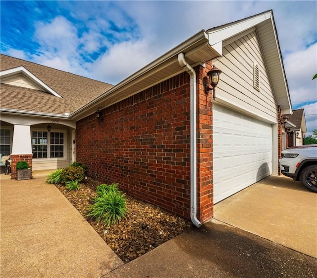 904 S Lafayette St, Rogers, AR 72758 - view of side of home with brick siding and driveway