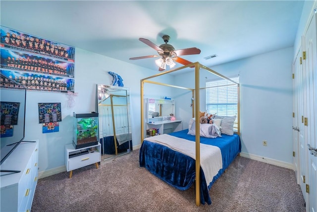 904 S Lafayette St, Rogers, AR 72758 - carpeted bedroom with baseboards and ceiling fan
