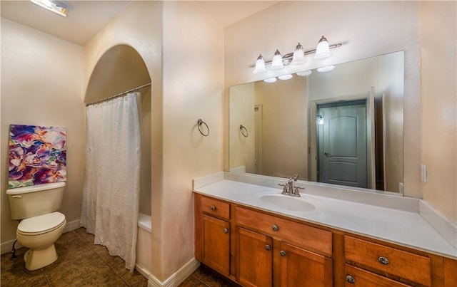 904 S Lafayette St, Rogers, AR 72758 - bathroom with vanity, tile patterned flooring, and shower / bath combo with shower curtain
