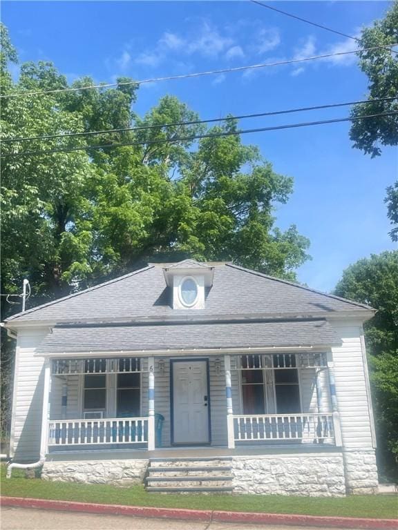 6 Kingshighway St, Eureka Springs, AR 72632 - view of front of house with covered porch and a shingled roof