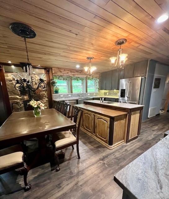 14163 Low Gap Wc 100 Rd, West Fork, AR 72774 - kitchen featuring a chandelier, stainless steel fridge with ice dispenser, wooden ceiling, dark wood-type flooring, and decorative light fixtures