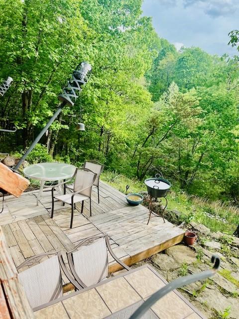 14163 Low Gap Wc 100 Rd, West Fork, AR 72774 - wooden deck with outdoor dining area