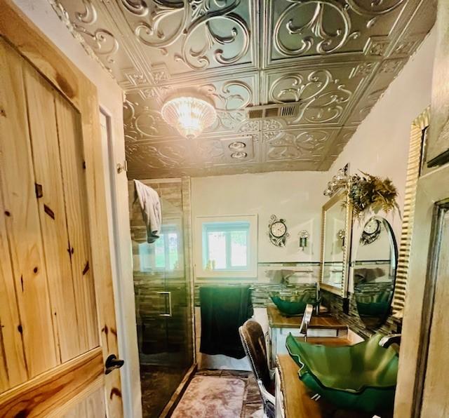 14163 Low Gap Wc 100 Rd, West Fork, AR 72774 - bathroom with an ornate ceiling, a stall shower, and vanity
