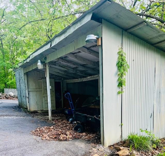 14163 Low Gap Wc 100 Rd, West Fork, AR 72774 - view of parking with a carport and a pole building
