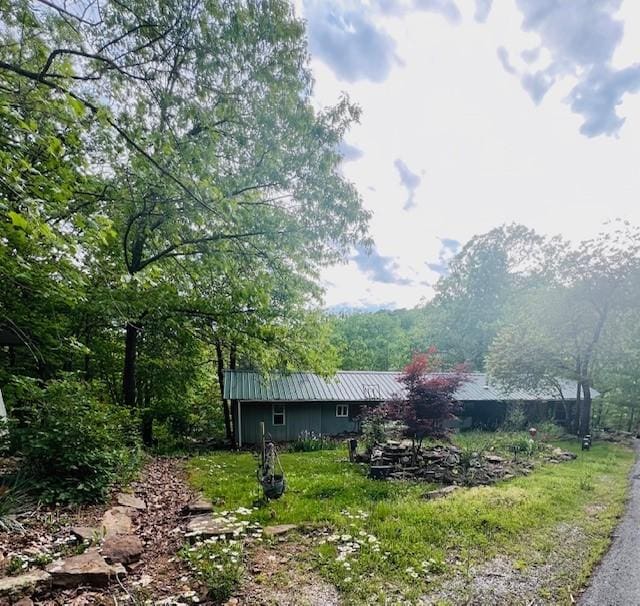 14163 Low Gap Wc 100 Rd, West Fork, AR 72774 - view of side of property with a metal roof and a view of trees