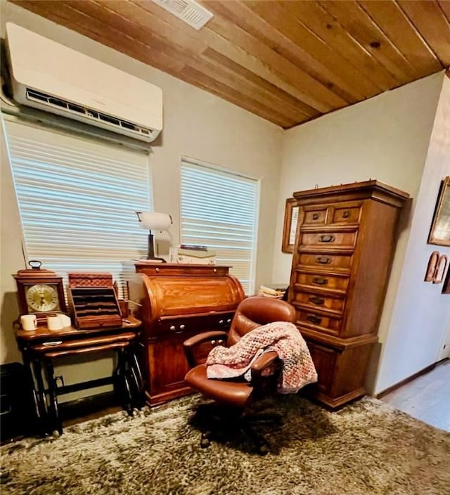 14163 Low Gap Wc 100 Rd, West Fork, AR 72774 - sitting room with a wall mounted air conditioner, wood finished floors, and wooden ceiling