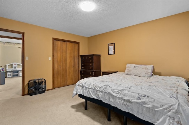 319 Belle Ave, Alma, AR 72921 - bedroom with carpet, a textured ceiling, and a closet