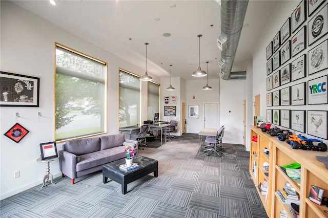 3901 W 5th St, Fayetteville, AR 72701 - living area with an office area, carpet floors, and a high ceiling