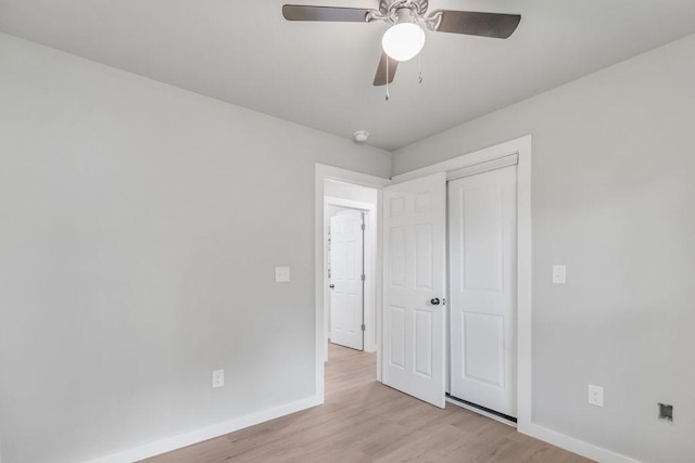 802 Hinshaw Dr, Springdale, AR 72762 - unfurnished bedroom featuring light wood-style flooring, a closet, and ceiling fan