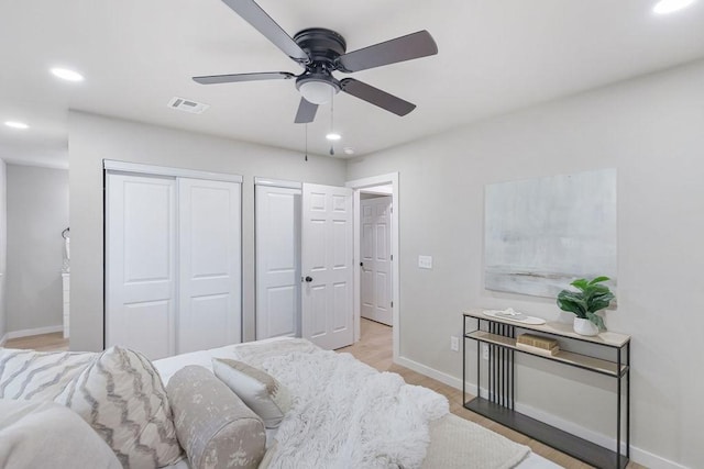 802 Hinshaw Dr, Springdale, AR 72762 - bedroom with recessed lighting, light wood finished floors, a ceiling fan, and multiple closets