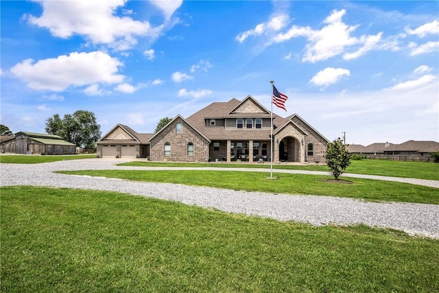 11267 Walters Rd, Bentonville, AR 72712 - view of front of home featuring a front yard, gravel driveway, and brick siding