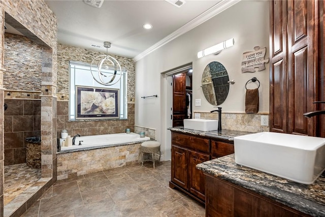 11267 Walters Rd, Bentonville, AR 72712 - bathroom featuring crown molding, a bath, double vanity, a walk in shower, and recessed lighting