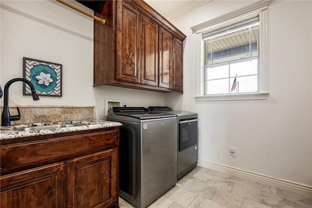 11267 Walters Rd, Bentonville, AR 72712 - laundry area with separate washer and dryer, cabinet space, and crown molding