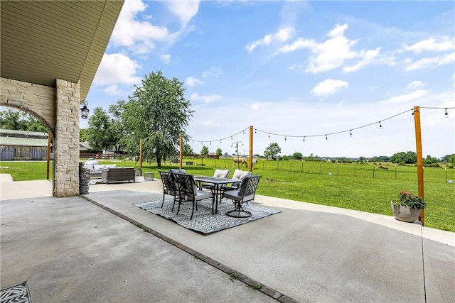 11267 Walters Rd, Bentonville, AR 72712 - fenced backyard featuring outdoor lounge area, a patio area, a view of rural / pastoral area, and outdoor dining space