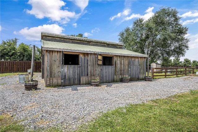 11267 Walters Rd, Bentonville, AR 72712 - view of outbuilding with an exterior structure