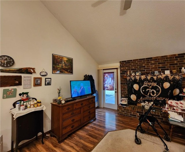 1805 Van Buren Ave, Mountain Home, AR 72653 - living area featuring wood finished floors, vaulted ceiling, and ceiling fan