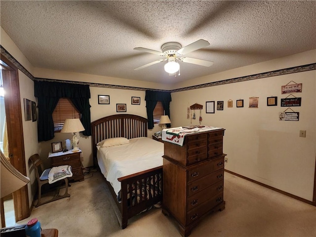 1805 Van Buren Ave, Mountain Home, AR 72653 - bedroom with light colored carpet, a textured ceiling, and a ceiling fan