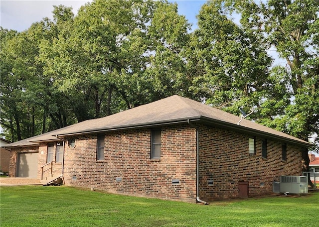 1805 Van Buren Ave, Mountain Home, AR 72653 - view of side of property with brick siding, a yard, a garage, and crawl space