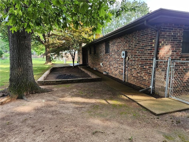 1805 Van Buren Ave, Mountain Home, AR 72653 - view of property exterior featuring brick siding