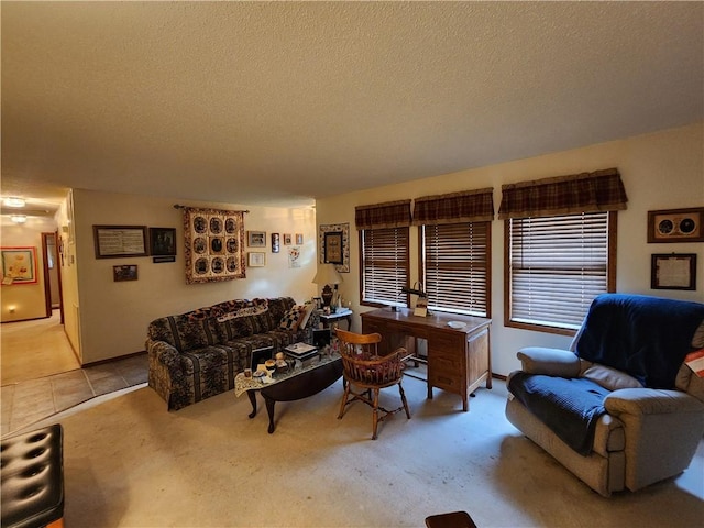 1805 Van Buren Ave, Mountain Home, AR 72653 - carpeted living room with a textured ceiling and a desk