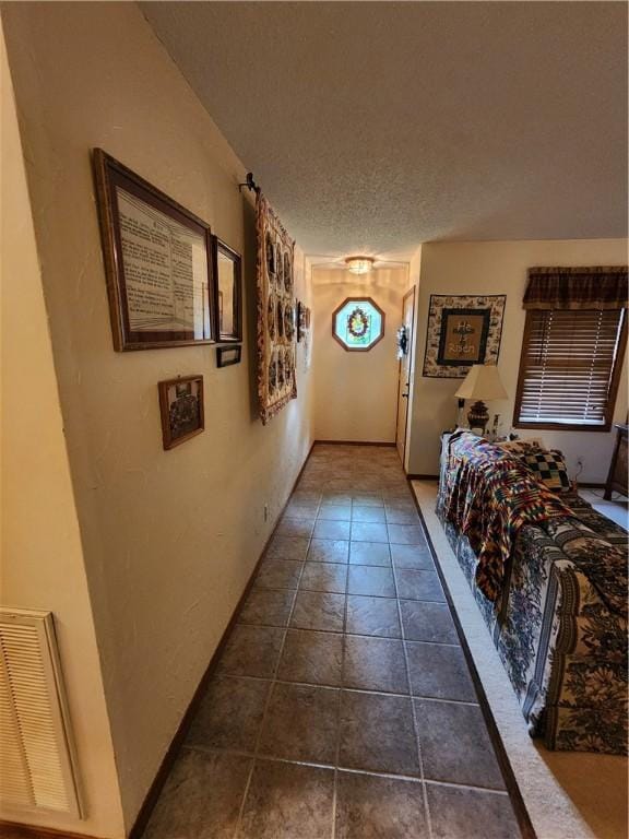 1805 Van Buren Ave, Mountain Home, AR 72653 - hallway featuring a textured ceiling