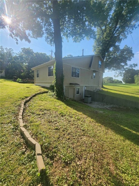 46 Hathcoat Rd, Harrison, AR 72601 - rear view of property with a yard
