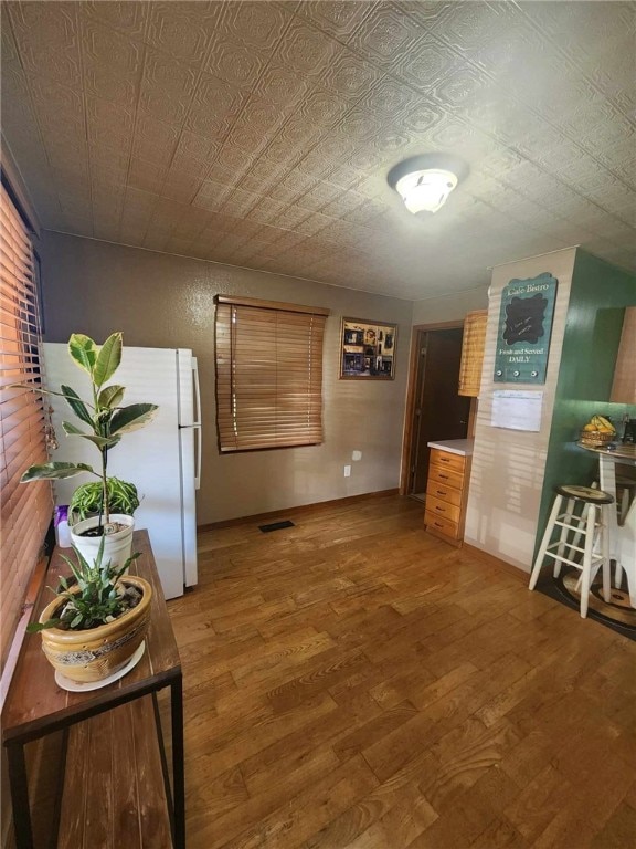 46 Hathcoat Rd, Harrison, AR 72601 - dining space with light wood finished floors and an ornate ceiling
