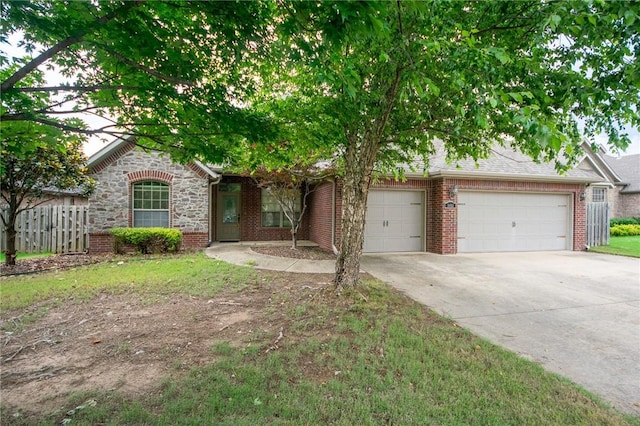 3402 Crosswinds Blvd, Bentonville, AR 72713 - view of front of property featuring driveway, an attached garage, and brick siding