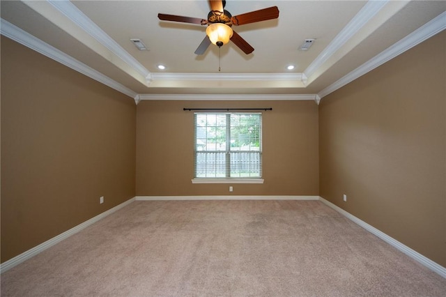 3402 Crosswinds Blvd, Bentonville, AR 72713 - spare room featuring a raised ceiling, ornamental molding, light colored carpet, and ceiling fan